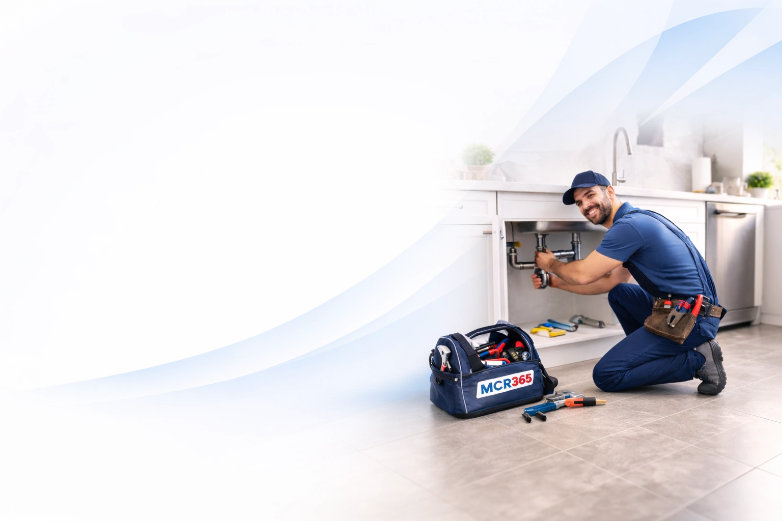MCR365 plumber repairing a kitchen sink